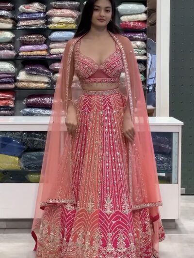 7802324B-6030-4330-B806-8ECA09802DBA Pink peach lehenga